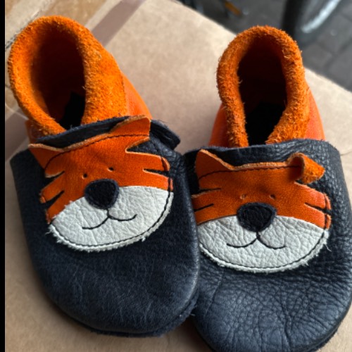 Orangenkinder Krabbelschuhe, zu finden beim Stand 34 am Standort Flohkids Hamburg West