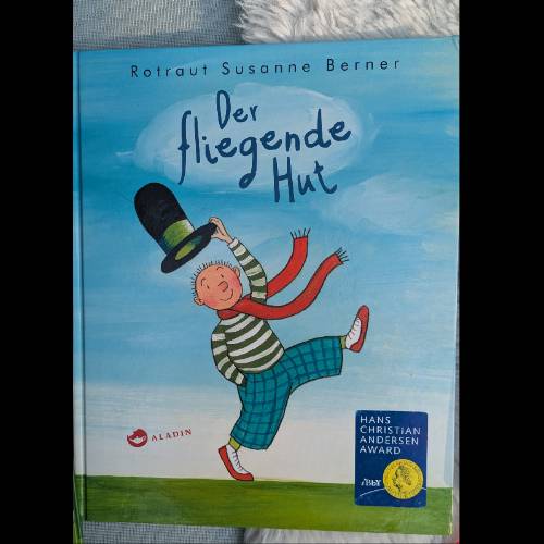 Buch - der fliegende Hut, zu finden beim Stand 94 am Standort Flohkids Hamburg West